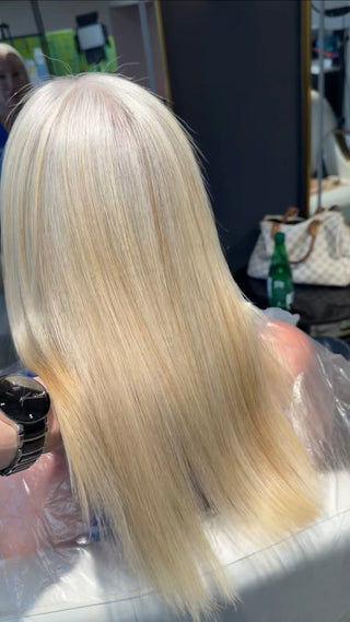 Chemically lightened blonde hair after a professional Keratin Treatment at Queen’s Hair Academy Toronto