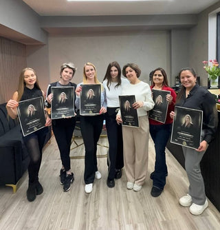 Queen's Hair Academy students with professional keratin treatment and nanoplastia certificates in Toronto